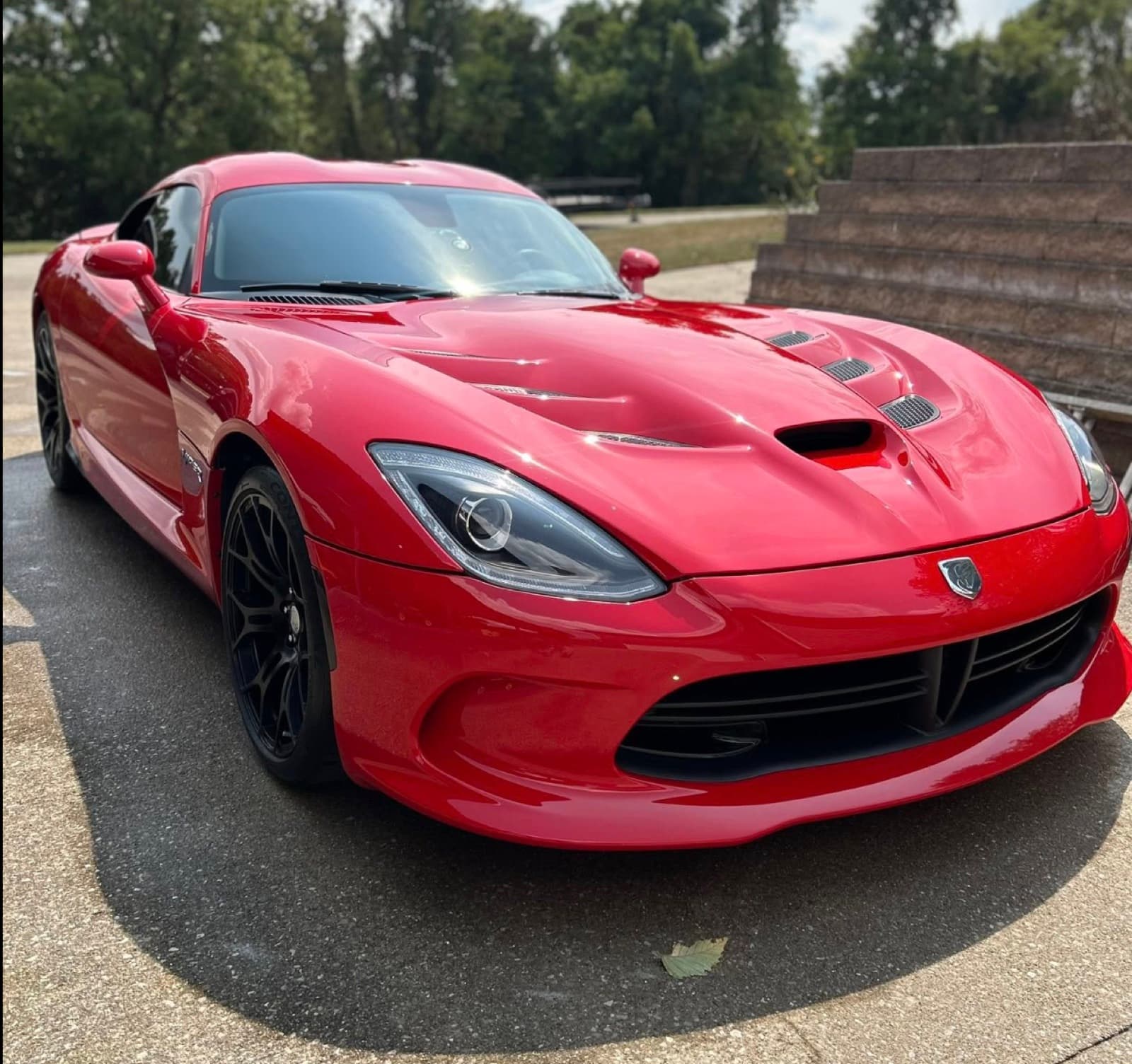 Red Dodge Viper after a full exterior detail in Leawood — front three-quarter view